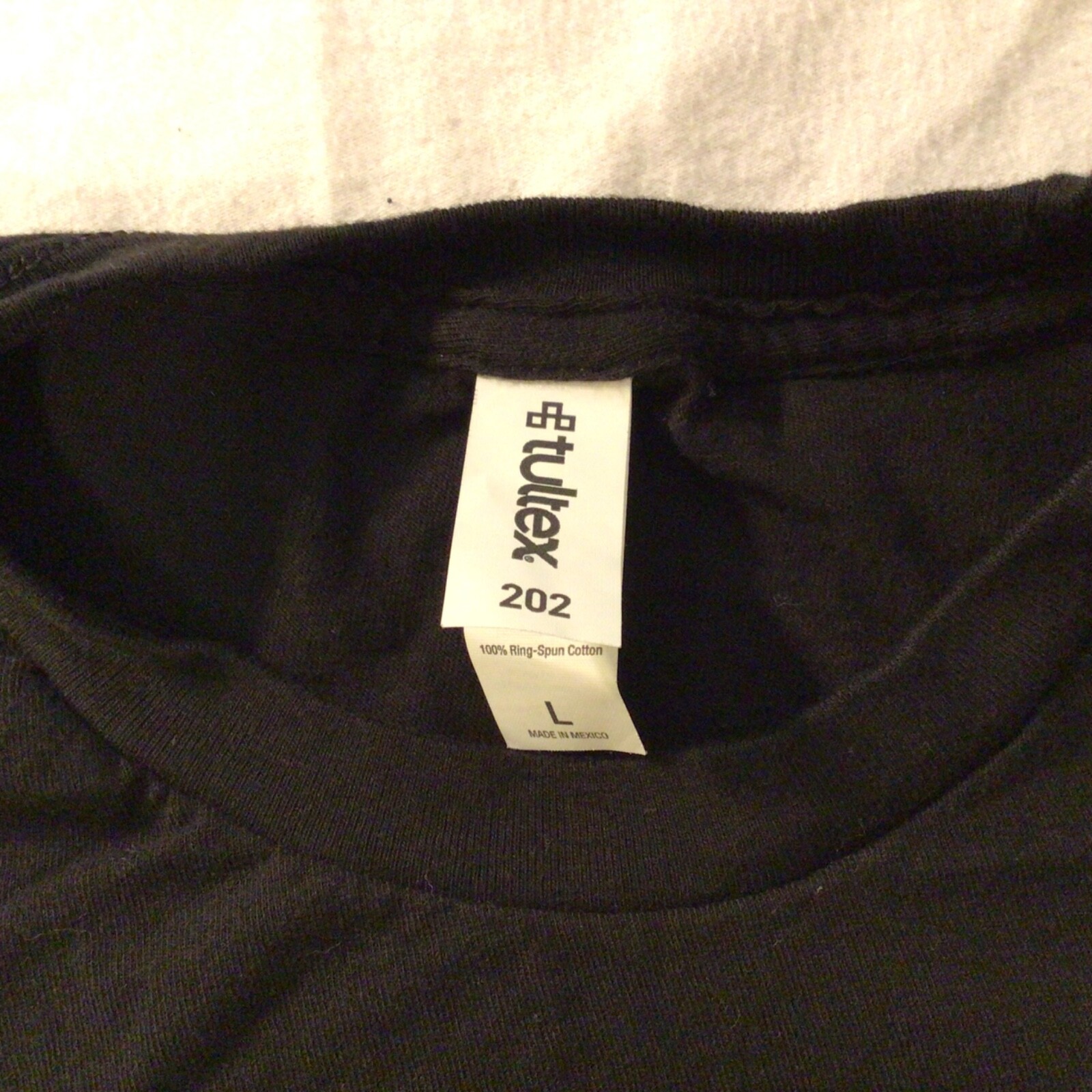 LCI logo Tultex Tag Size Large T-shirt Black with logo. 100% cotton