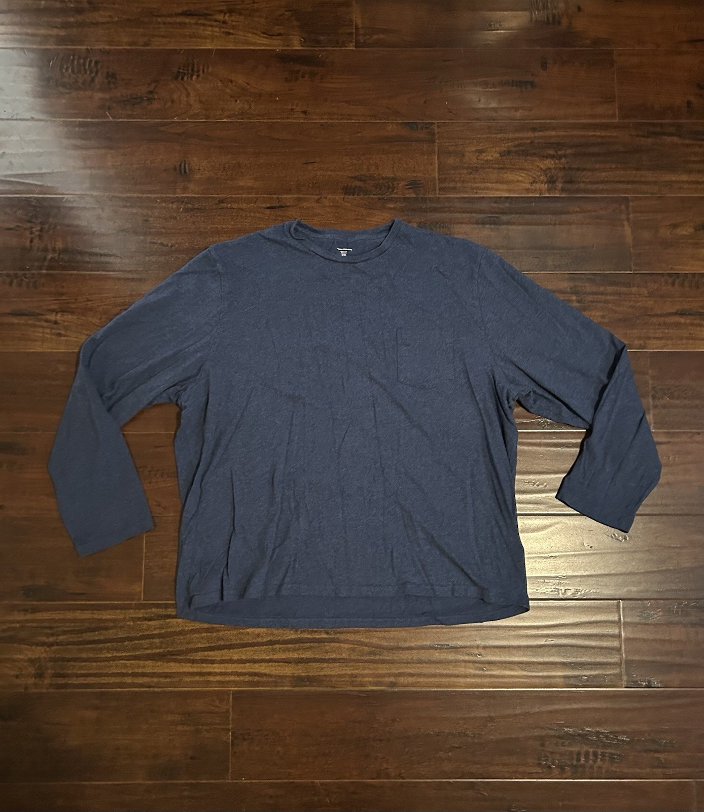 blue amazon essentials longsleeve size 2xl small hole on back and sleeve