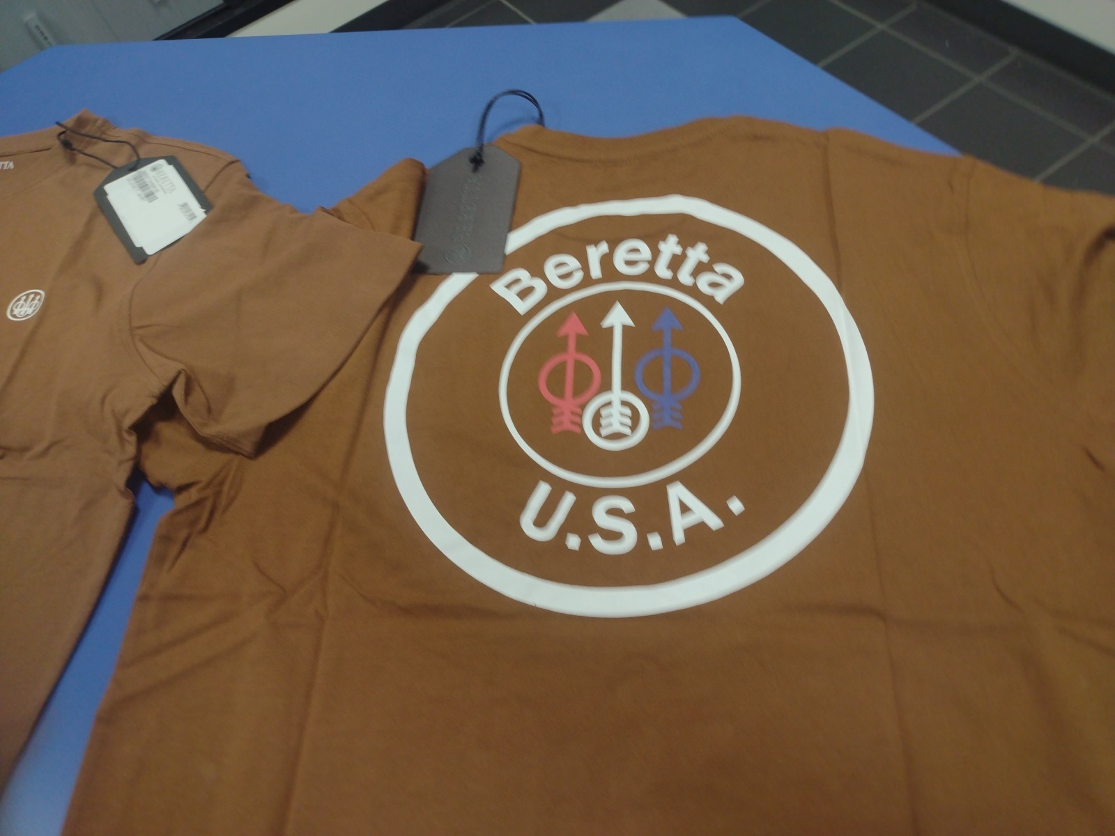 2 Official Licensed Beretta Tabacoo Brown Circle T Shirt Gun Pistol UK M / US S