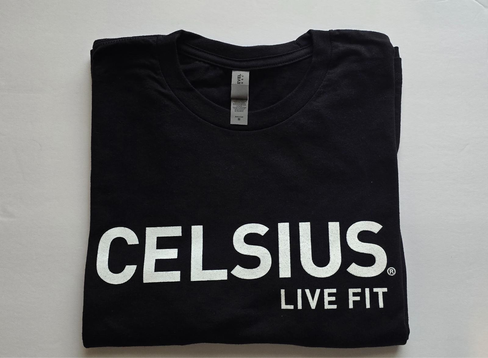 Celsius Live Fit Merch Bundle: T-shirt, Shaker Bottle, and Drawstring Bag