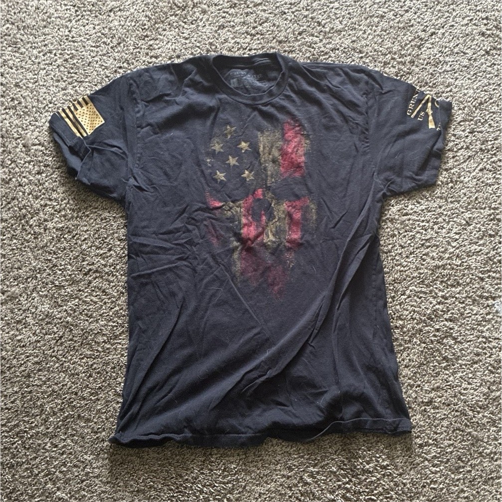 Grunt Style This We&rsquo;ll Defend Black American Flag Graphic Tagless Tee L