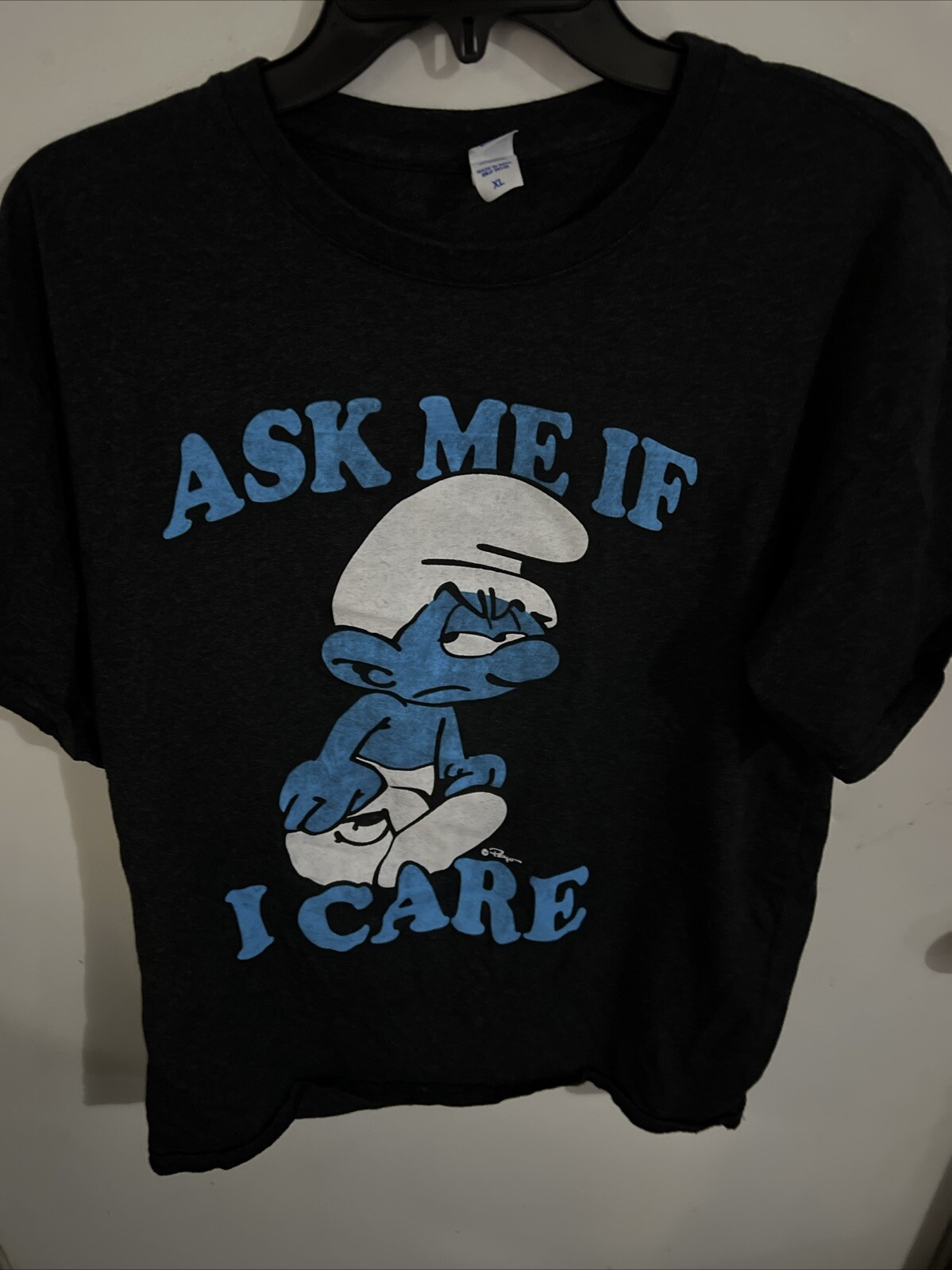 The Smurfs Men&rsquo;s Brisco Brands Grumpy Smurf Ask Me If I Care T Shirt Size L
