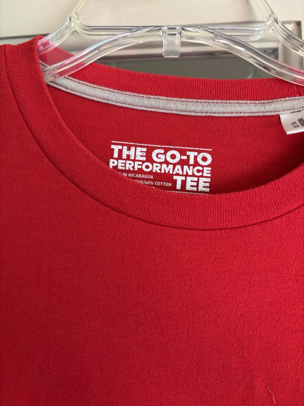 Red Adidas performance tee size medium. Short sleeve. 60/40 poly/cotton.