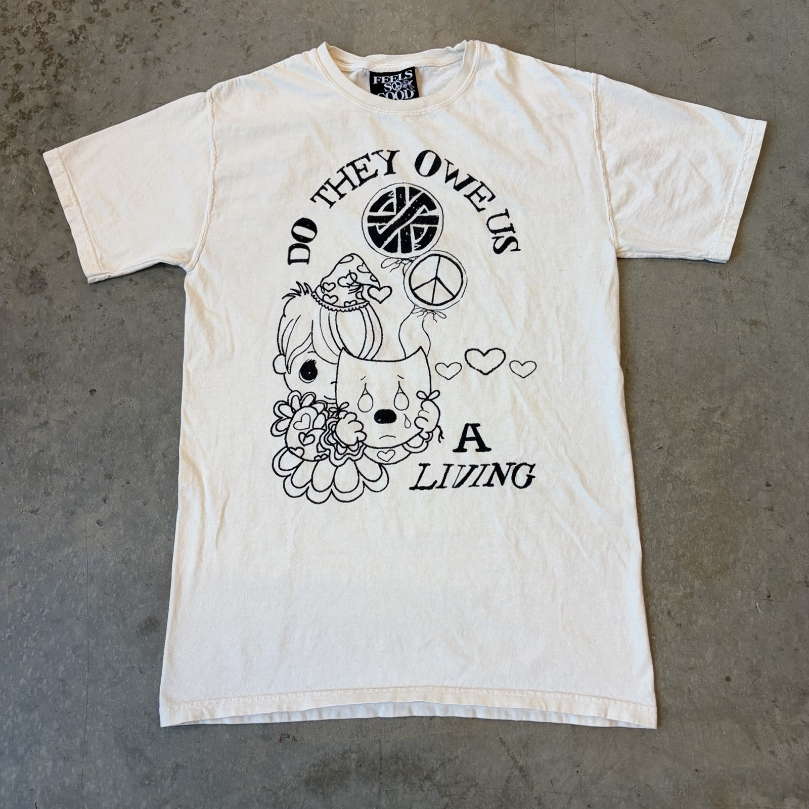 Feels So Good Do They Owe Us A Living Child Mask Peace Graphic T-Shirt Small