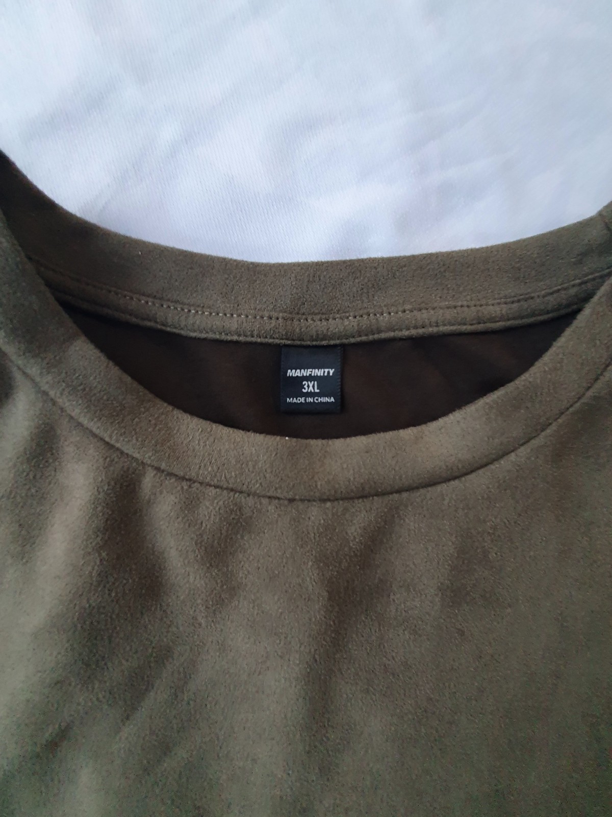 MANFINITY t-shirt with a simulated 0 graphic on the back and a distinctive soft