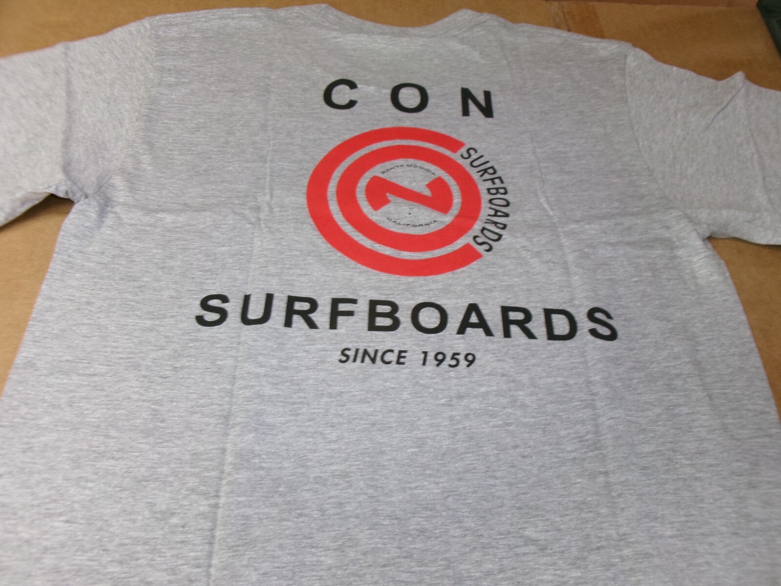 CON SURFBOARDS SANTA MONICA, CALIFORNIA SINCE1959 CLOSE OUT SALE T-SHIRT. NEW!