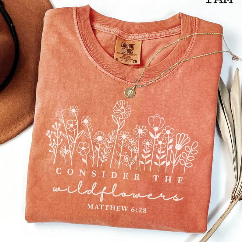 comfort tee consider the wildflowers bible verse