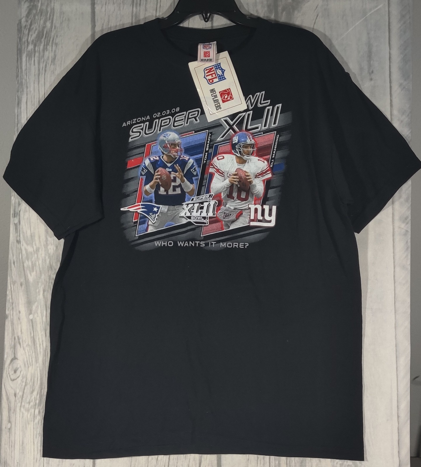 2008 NFL Super Bowl XLII “Who Wants It More?” Tom Brady Eli Manning Black Shirt
