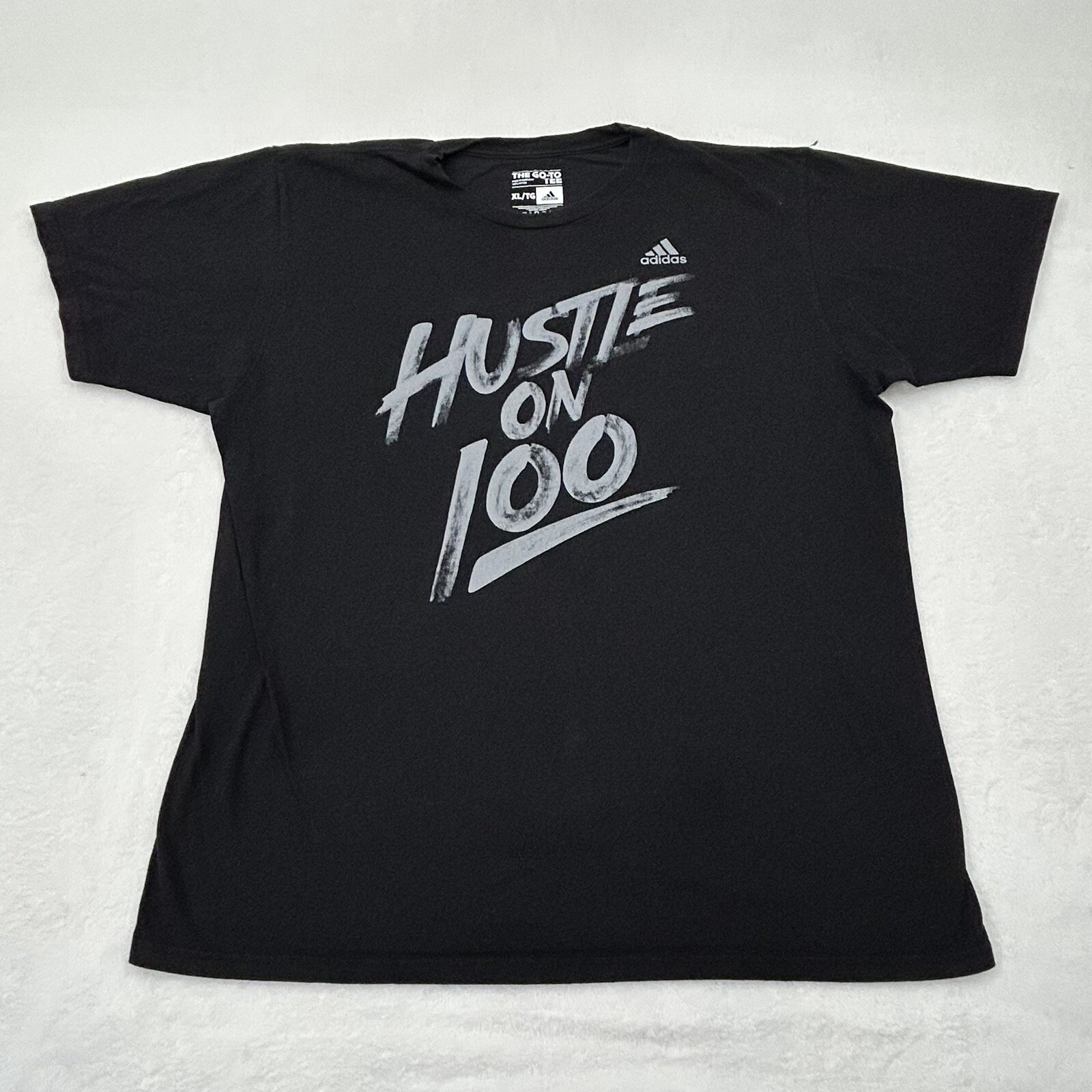 Adidas The Go-To Tee Hustle On 100 Graphic Spell out Black Cotton Shirt Men’s XL