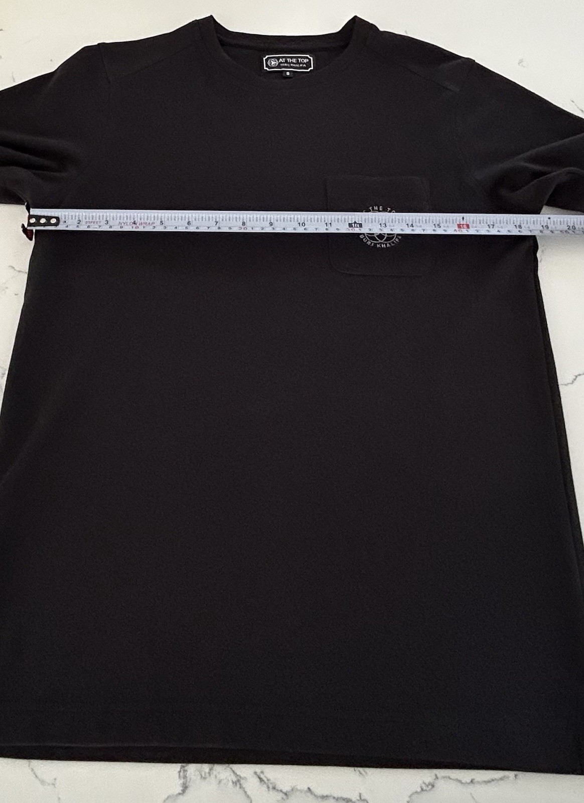 At The Top Of Burj Khalifa skyscraper, Dubai, UAE – Black Pocket Logo T-Shirt, S