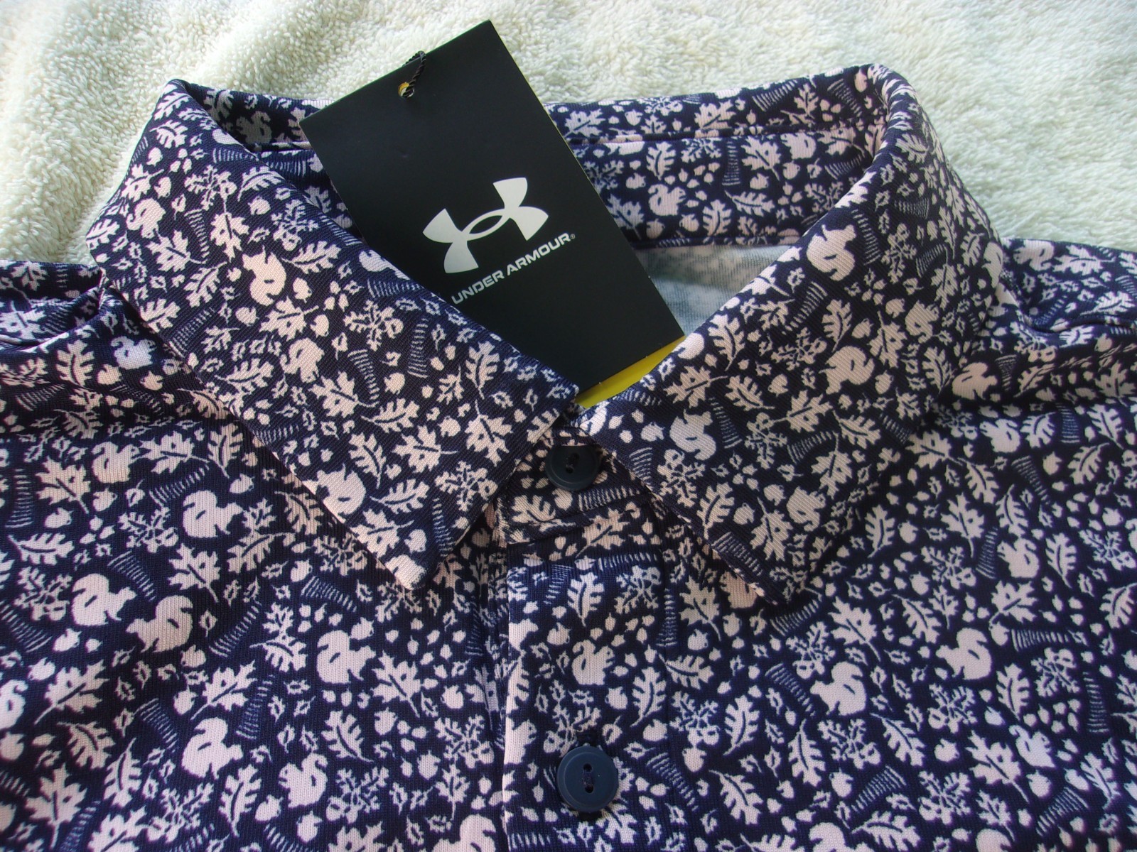 NWT Under Armour Loose Fit golf polo, men&rsquo;s L, blue, pink squirrels, poly., $70