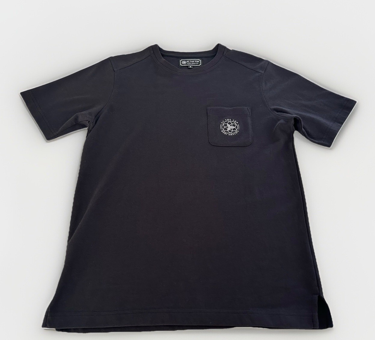 At The Top Of Burj Khalifa skyscraper, Dubai, UAE – Black Pocket Logo T-Shirt, S