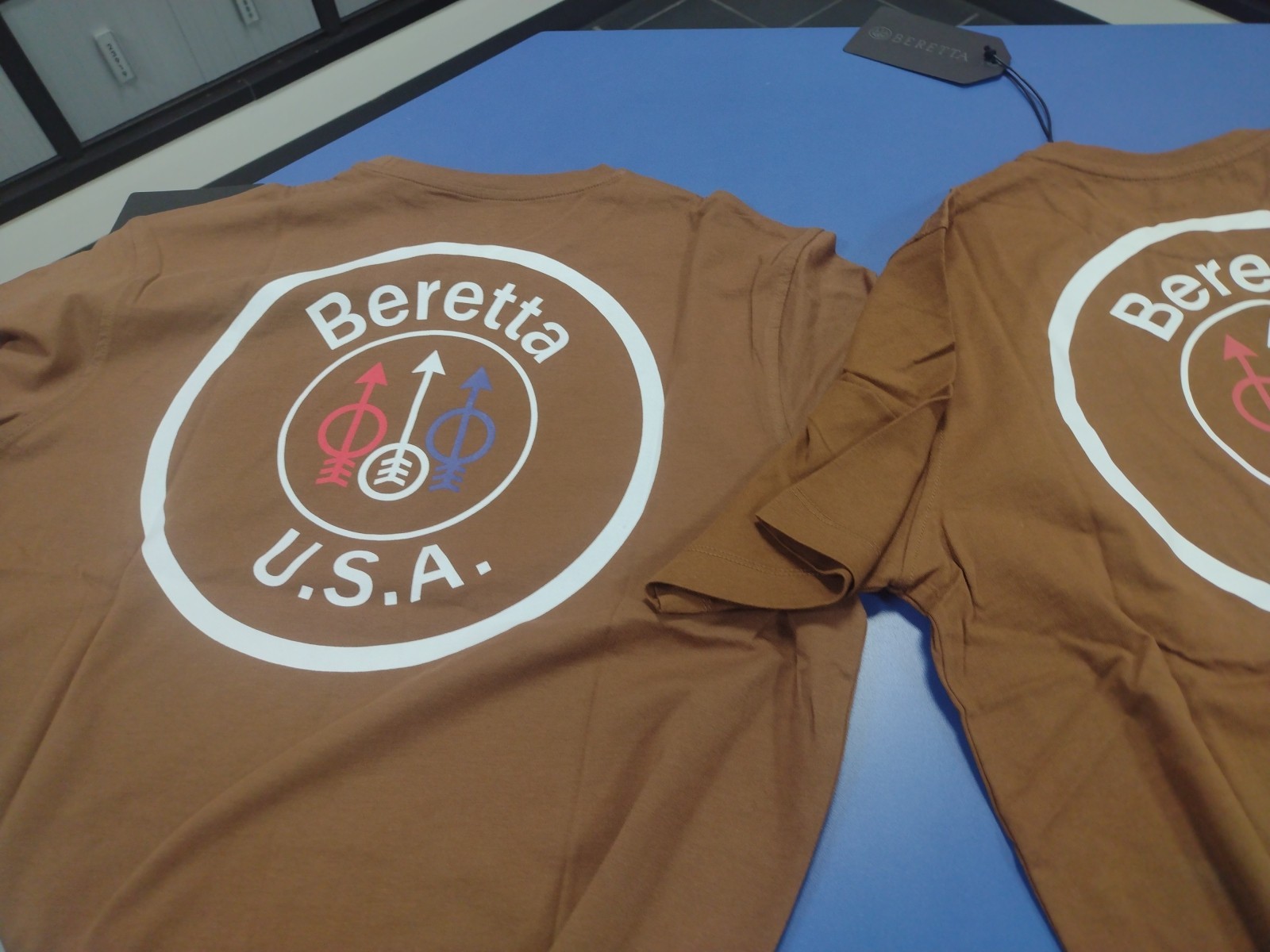 2 Official Licensed Beretta Tabacoo Brown Circle T Shirt Gun Pistol UK M / US S