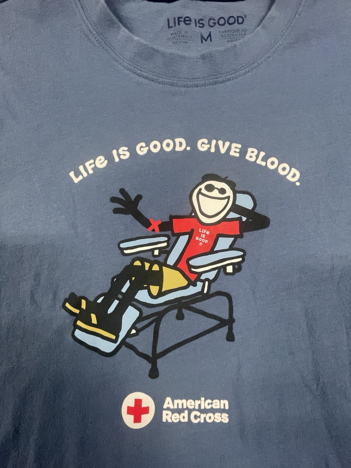 Life is Good Men&rsquo;s Blue Give Blood Red Cross Graphic Crew Neck T-Shirt M