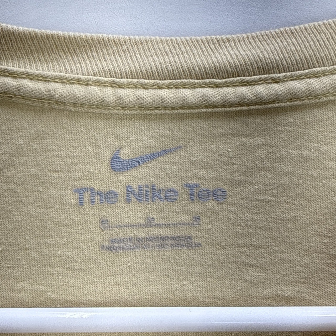 The Nike Tee Men’s Tan Nike Golf Graphic T-Shirt