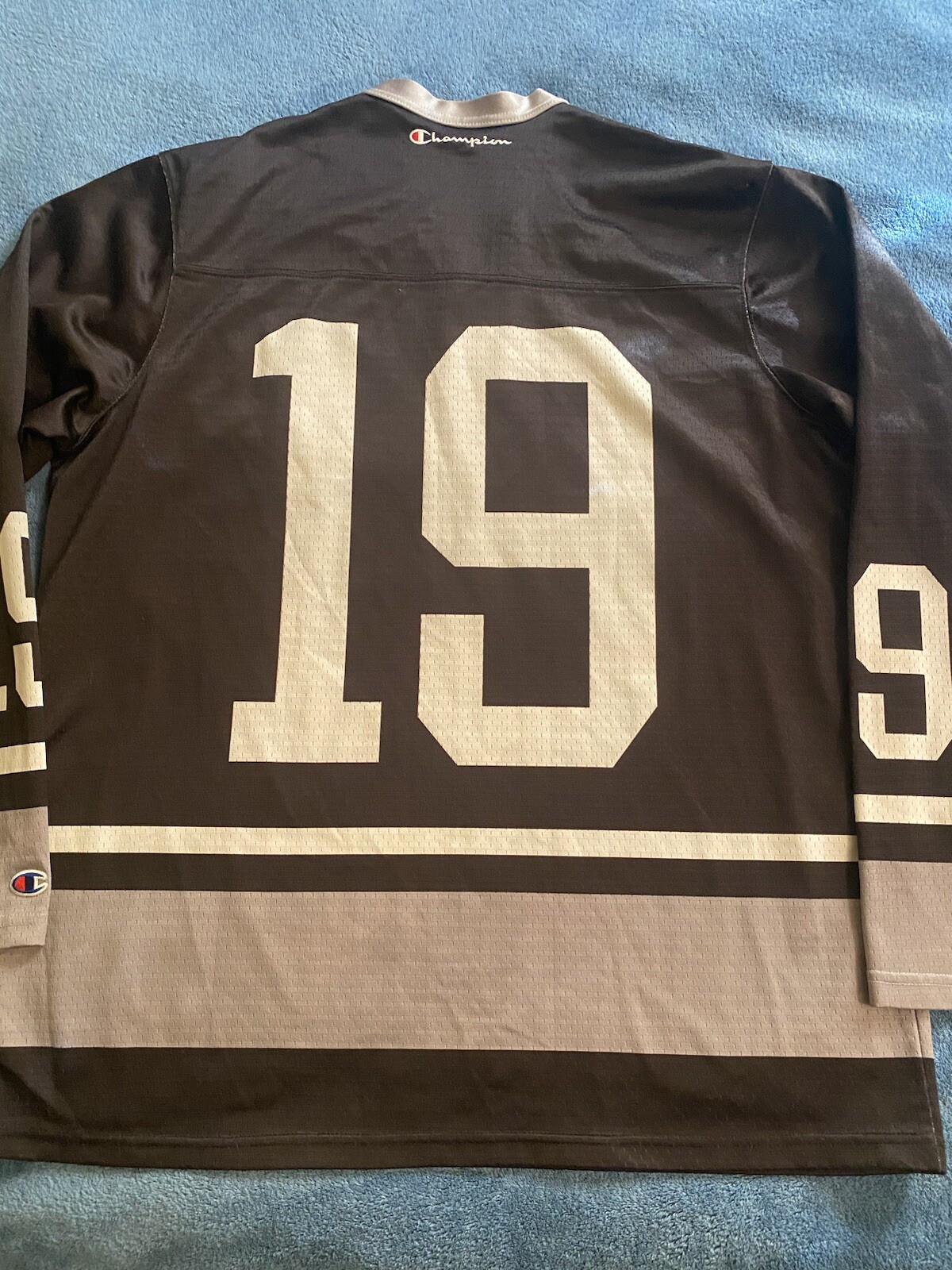 Champion #19 Champion Logo Hockey Jersey Sz L (44) (25in W X 30in L) Black