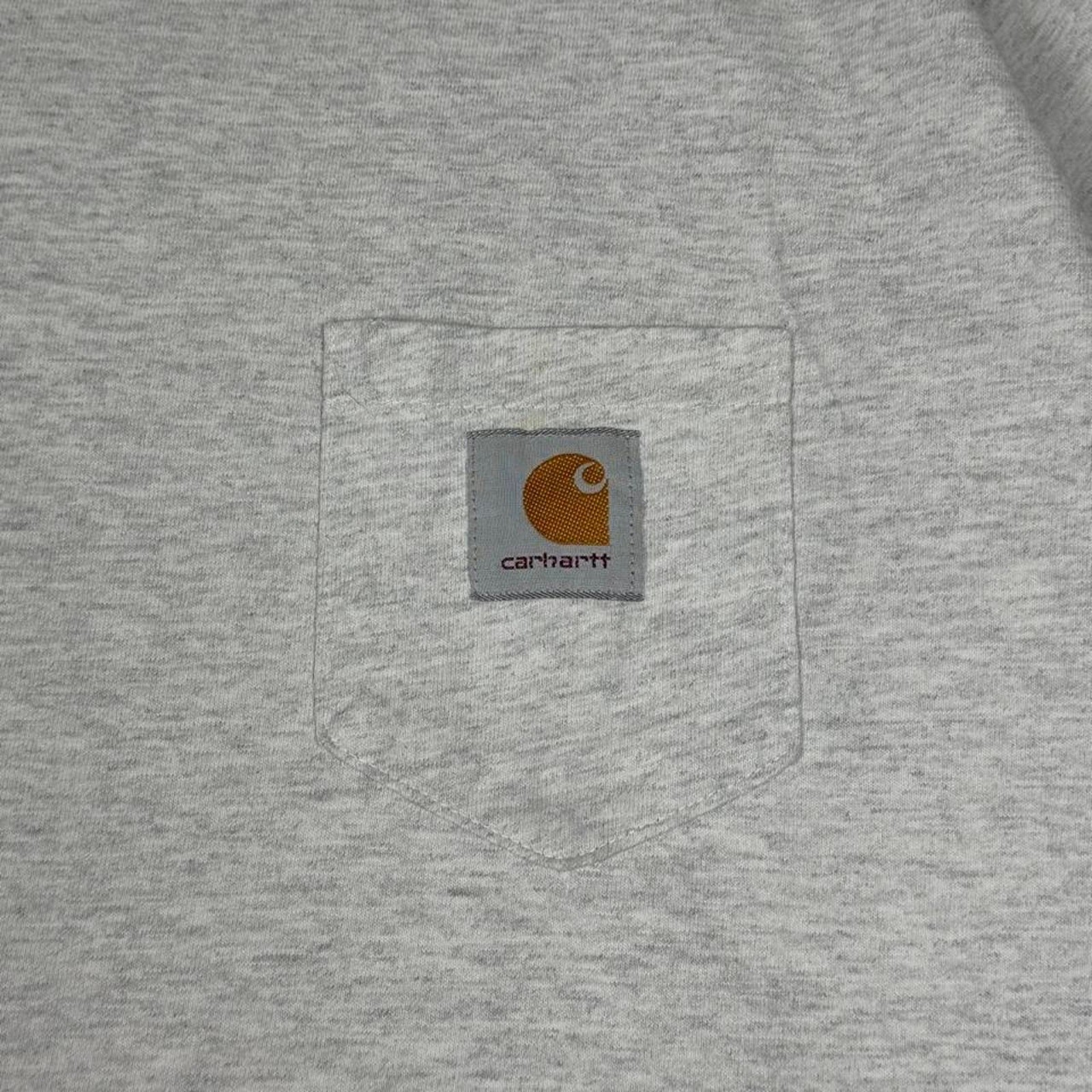 Worn grey carhartt pocket tee